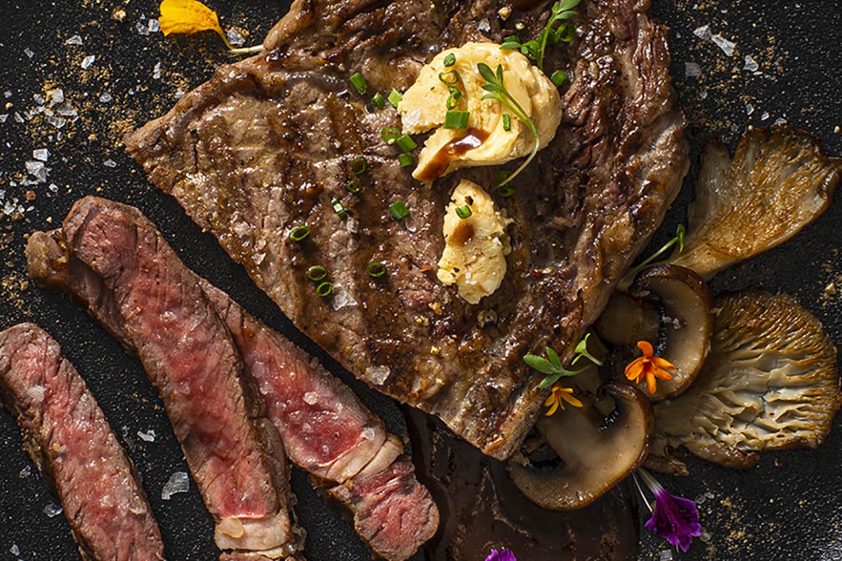 Spiced Bison Rib-Eye with Miso Butter and Red Wine Mushroom Sauce